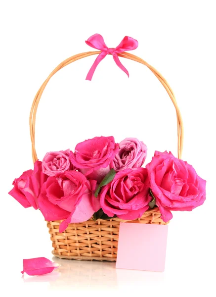 Beautiful pink roses in basket isolated on white — Stock Photo, Image
