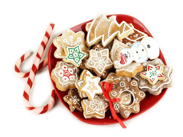 Christmas treats on plate isolated on white — Stock Photo, Image
