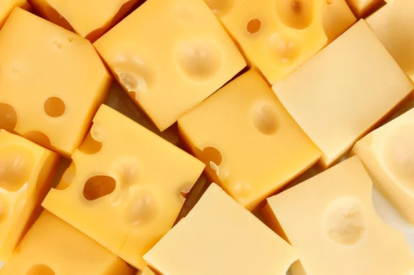 Cheese cubes background — Stock Photo, Image