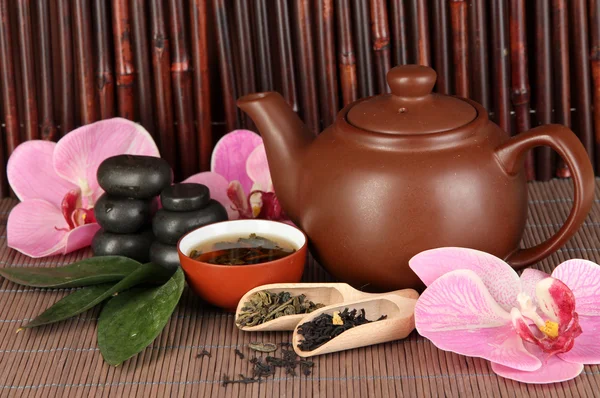 Chinese tea ceremony on bamboo table on bamboo background — Stock Photo, Image