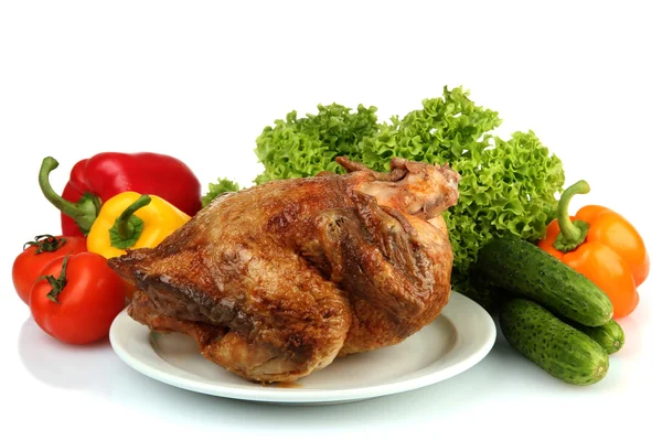 Tasty whole roasted chicken on plate with vegetables, isolated on white — Stock Photo, Image