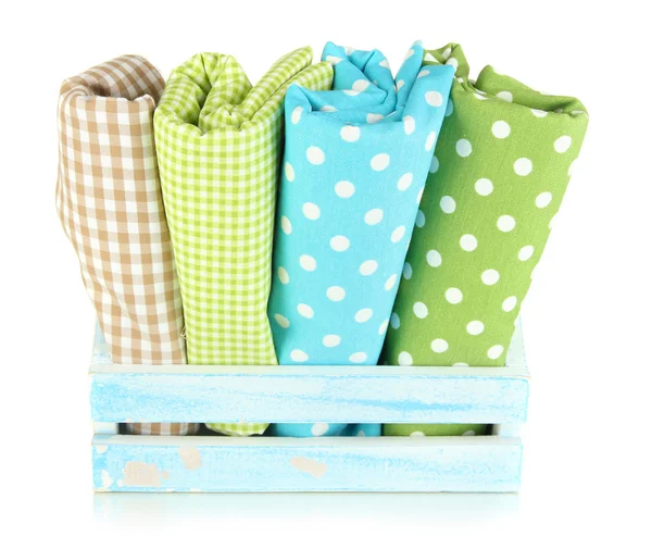 Color mottled fabrics in basket isolated on white — Stock Photo, Image