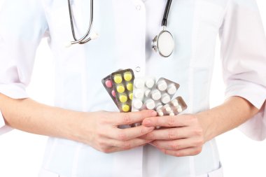 kadın doktor el hapları, üzerinde beyaz izole tutarak yakın çekim