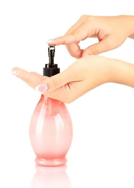 Woman squeezing lotion on her hand, on white background close-up — Stock Photo, Image