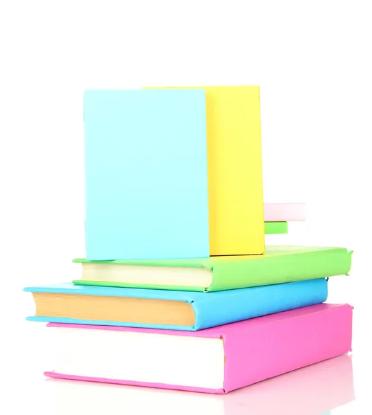 Stos książek multicolor na białym tle — Zdjęcie stockowe
