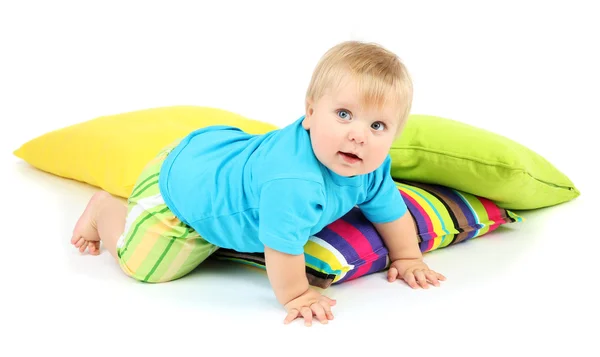 Pequeño niño y almohadas de color, aislado en blanco —  Fotos de Stock