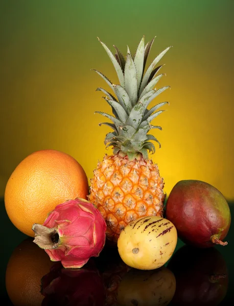 Composition of exotic fruits on colorful background — Stock Photo, Image