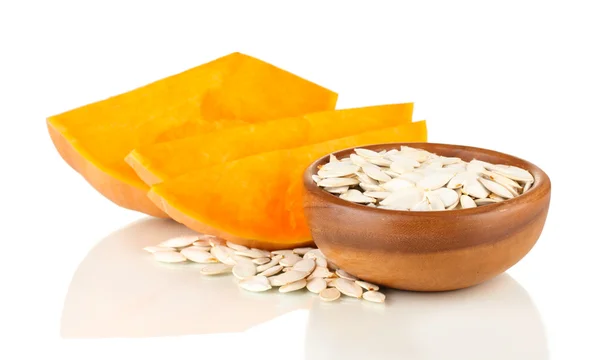 Pumpkin seeds in wooden bowl isolated on the white — Stock Photo, Image