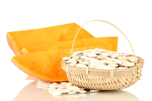 Pumpkin seeds in wicker basket, isolated on the white — Stock Photo, Image