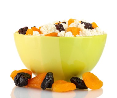Cottage cheese in color bowl with fruits, isolated on white