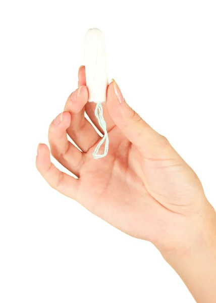 Mão da mulher segurando um tampão de algodão limpo no fundo branco close-up — Fotografia de Stock