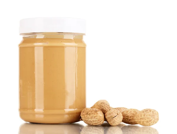 Delicious peanut butter in jar of peanut near isolated on white — Stock Photo, Image