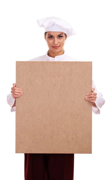 Portrait de jeune femme chef avec tableau vide isolé sur blanc — Photo