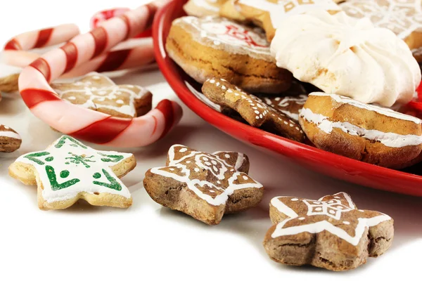 Christmas treats on plate isolated on white — Stock Photo, Image