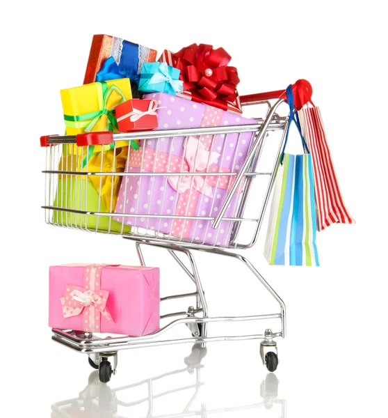 Christmas gifts and shopping in trolley isolated on white — Stock Photo, Image