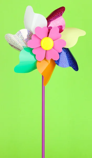 Kolorowe pinwheel na zielonym tle — Zdjęcie stockowe