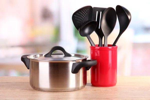 Kitchen tools on table in kitchen — Stock Photo, Image