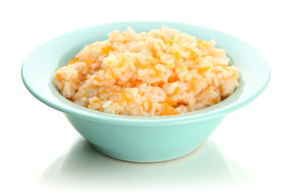 Taste rice porridge with pumpkin in blue bowl, isolated on white — Stock Photo, Image