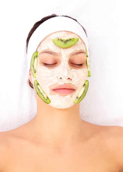 Young woman with clay facial mask — Stock Photo, Image
