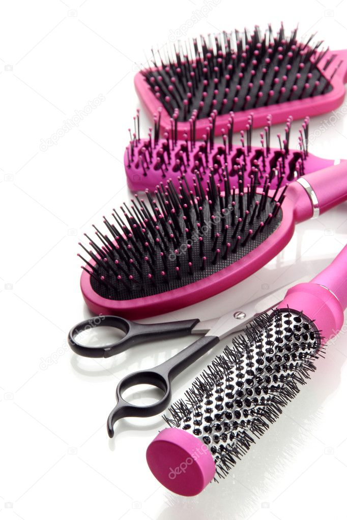 Comb brushes and Hair cutting shears, isolated on white