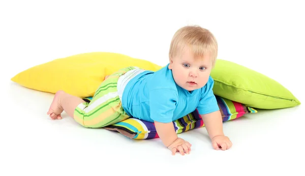 Маленький мальчик и цветные подушки, изолированные на белом — стоковое фото