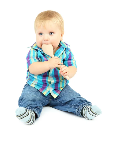 Kleine jongen met houten lepel, geïsoleerd op wit — Stockfoto