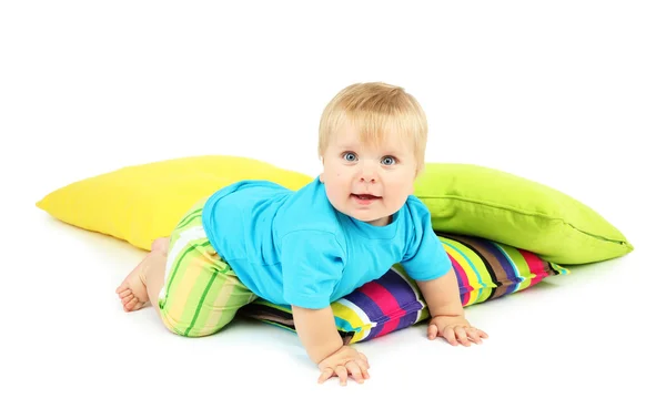 Kleine jongen en kleur kussens, geïsoleerd op wit — Stockfoto