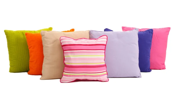Almohadas coloridas aisladas en blanco — Foto de Stock