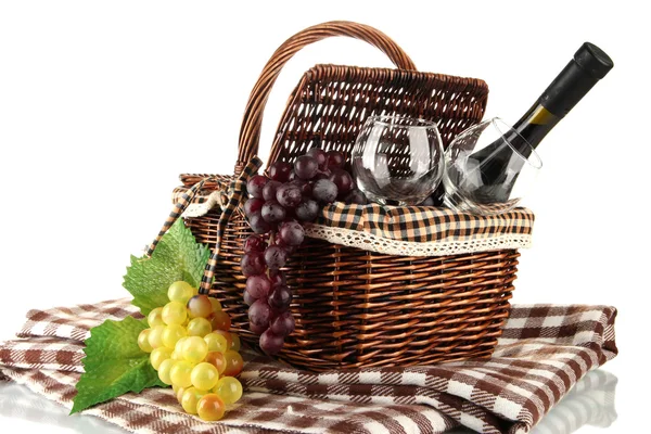 Picnic basket with fruits and bottle of wine isolated on white — Stock Photo, Image