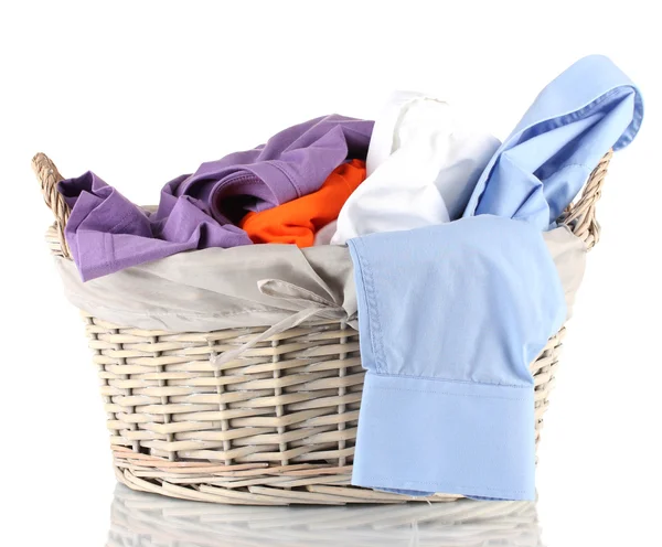 Bright clothes in laundry basket, isolated on white — Stock Photo, Image