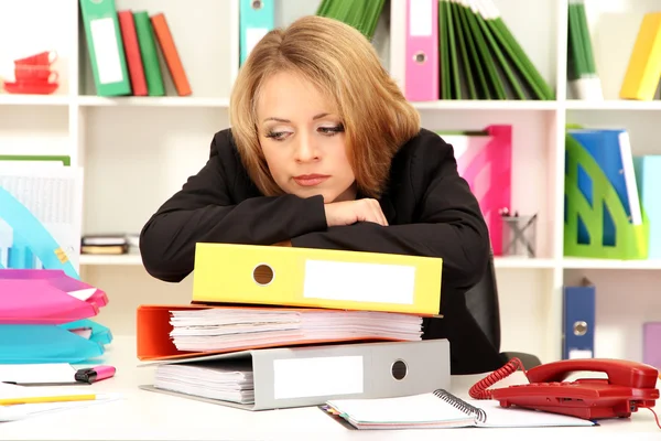 Tired business woman working in office — Stock Photo, Image