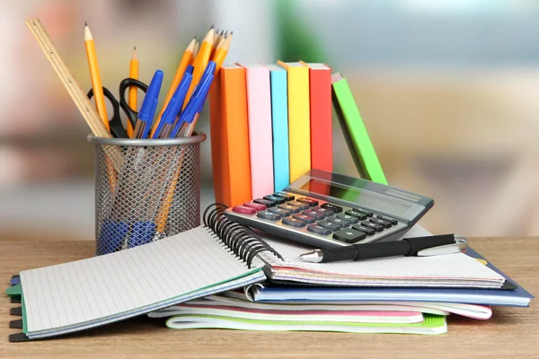 School supplies and books on wooden table — Stock Photo, Image