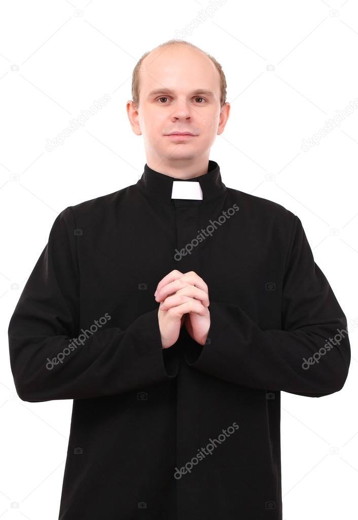 Young priest isolated on white