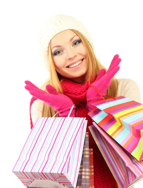 Mulher jovem atraente com muitos sacos de compras, isolado em branco — Fotografia de Stock