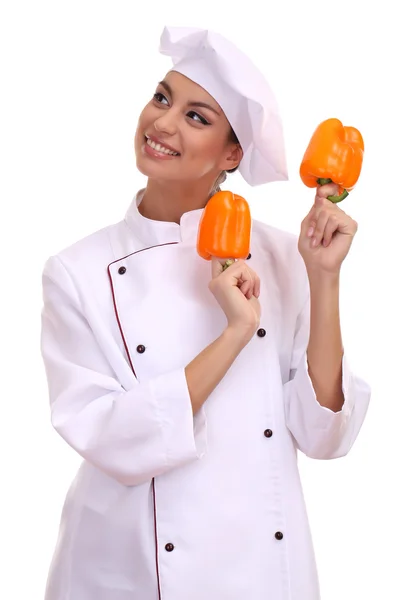 Retrato de mujer joven chef con verduras aisladas en blanco — Foto de Stock