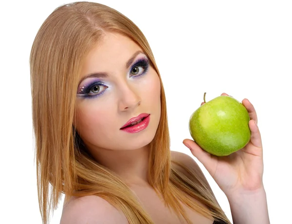 Beautiful young woman with glamour make up and apple, isolated on white — Stock Photo, Image