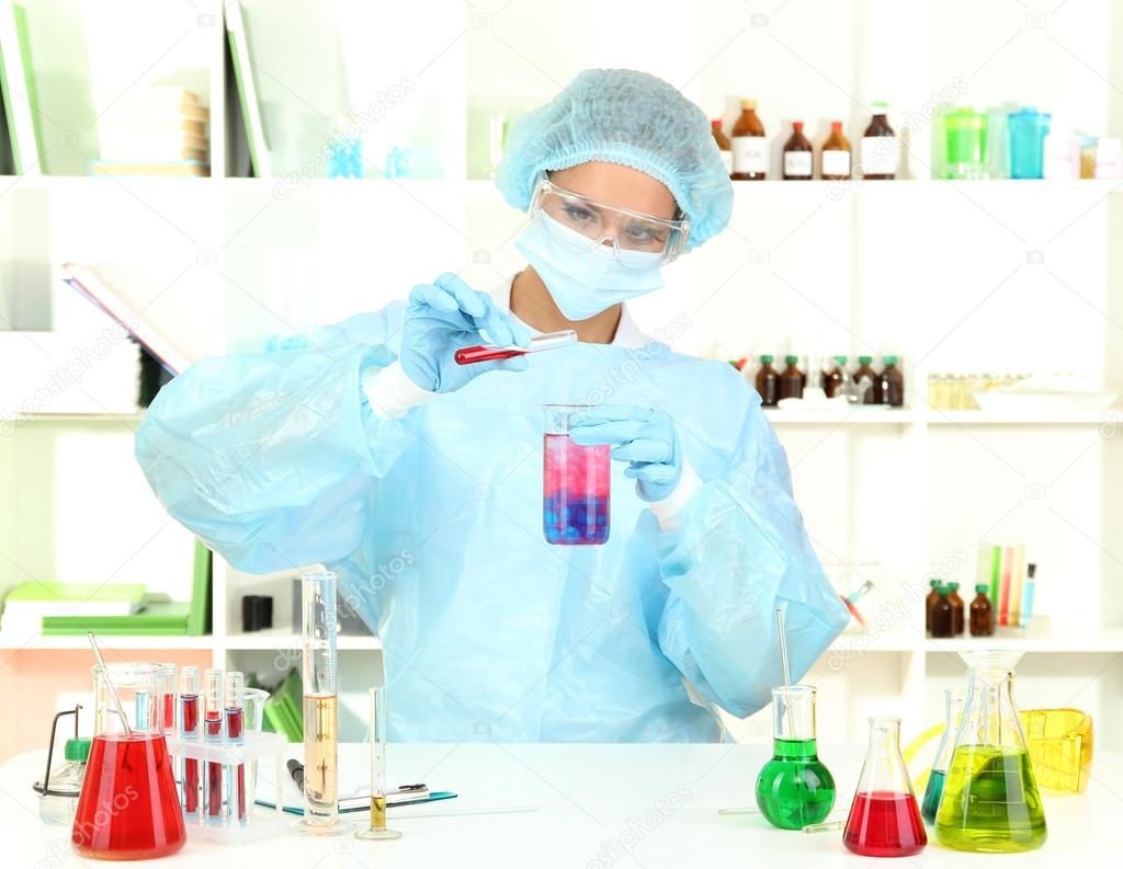 Young female scientist in laboratory