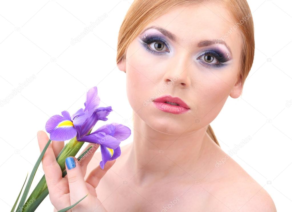 Beautiful young woman with glamour make up and flower, isolated on white