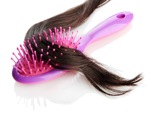 comb brush with hair, isolated on white