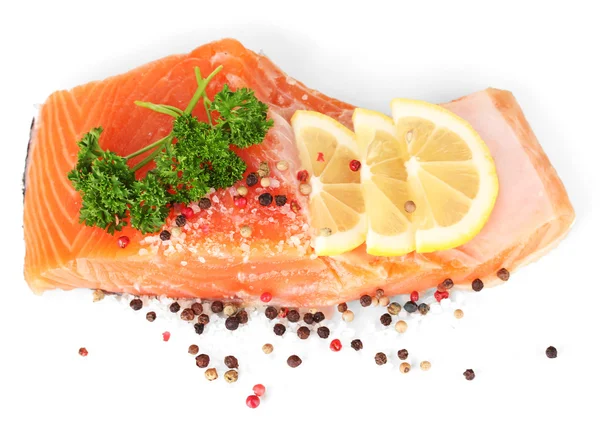 Fresh salmon fillet with herbals and lemon slices, isolated on white — Stock Photo, Image