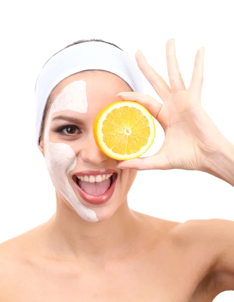 Jonge vrouw met klei gezichtsmasker, geïsoleerd op wit — Stockfoto
