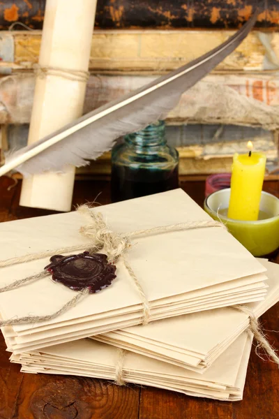 Stacks of old letters on wooden table — Stock Photo, Image