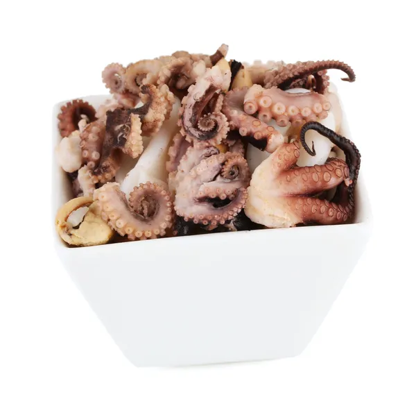 Tentacles of octopus in bowl isolated on white — Stock Photo, Image