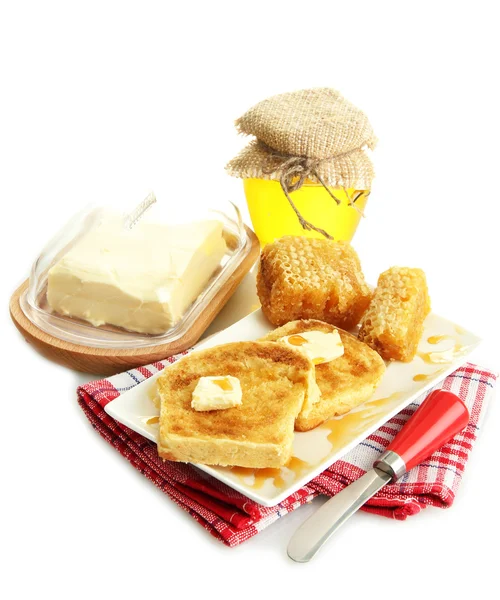Pan blanco tostado con miel en plato, aislado sobre blanco — Foto de Stock