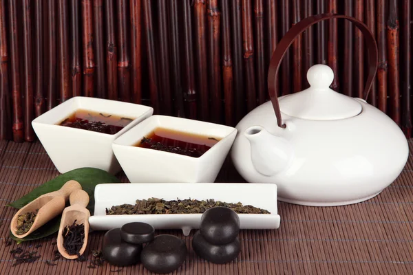 Chinese tea ceremony on bamboo table on bamboo background — Stock Photo, Image