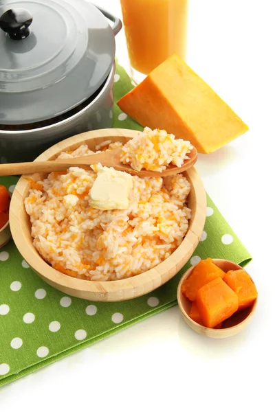 Taste rice porridge with pumpkin, isolated on white — Stock Photo, Image