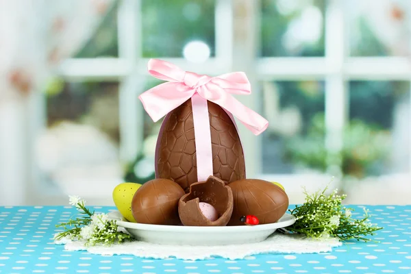 Composition of Easter and chocolate eggs on window background — Stock Photo, Image