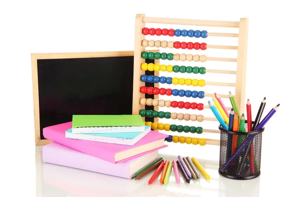 Игрушки, школьный стол, книги и карандаши, изолированные по белому — стоковое фото