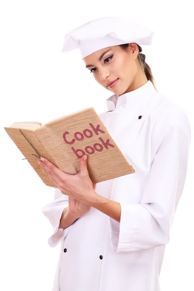 Retrato de jovem chef com livro de cozinha isolado em branco — Fotografia de Stock