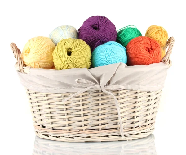 Colorful yarn balls in wicker basket isolated on white — Stock Photo, Image